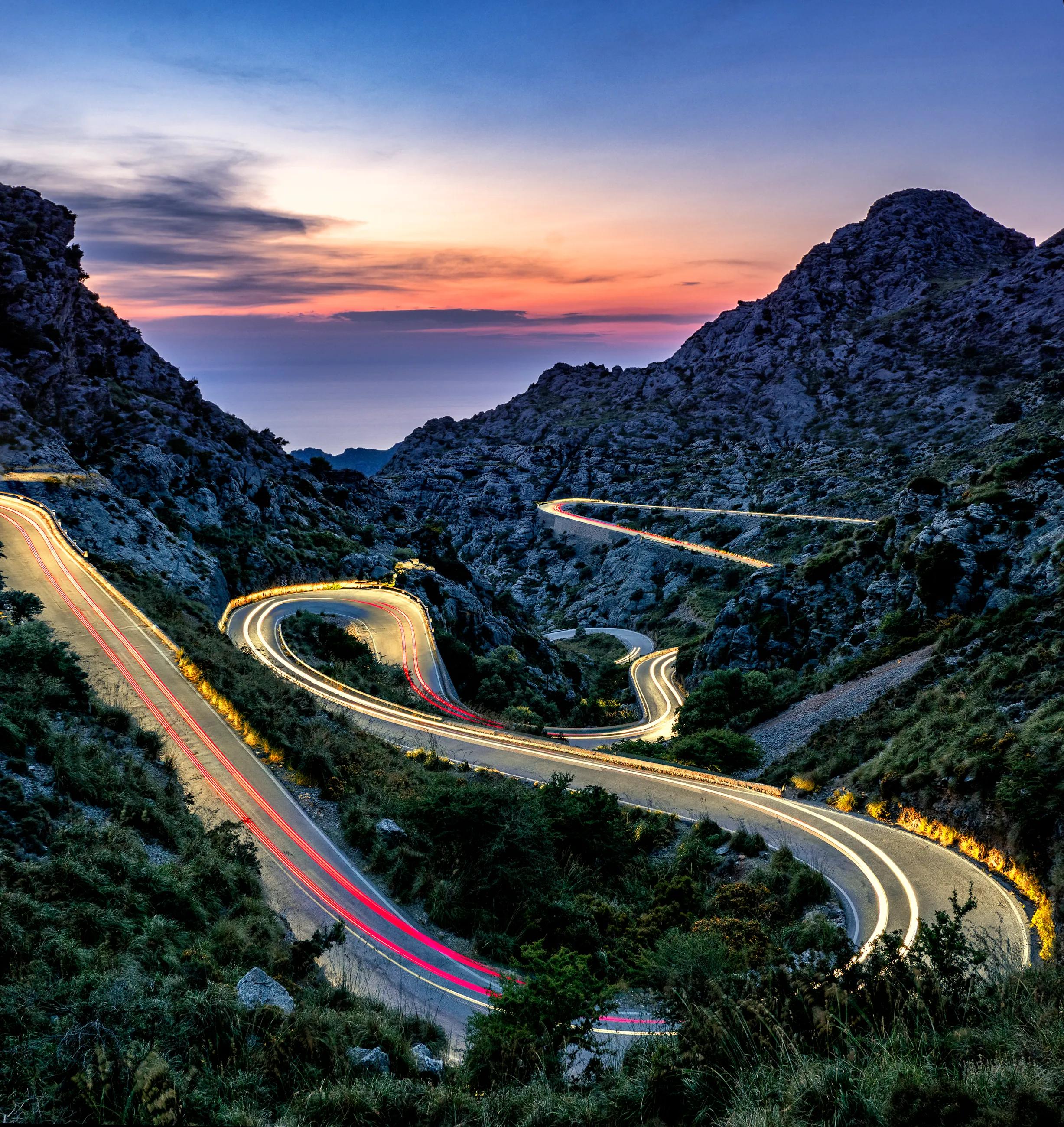Winding road around a mountian slow shutter speed