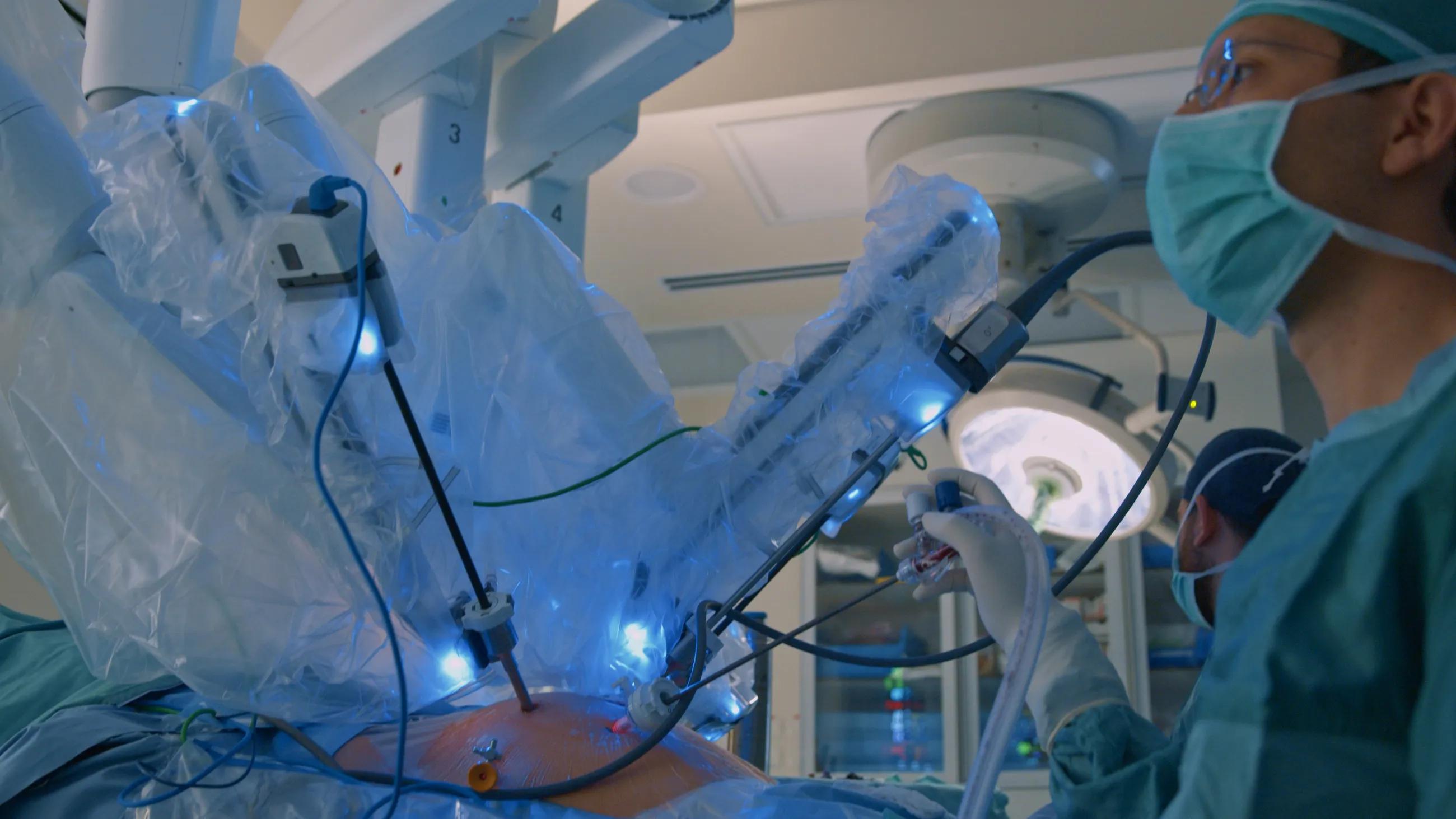 surgon using technology during surgery