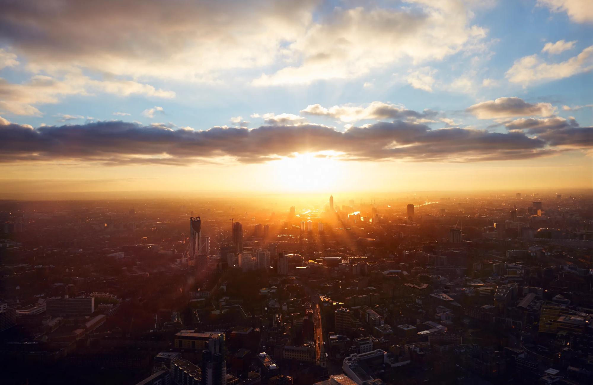 a city sunrise on a misty morning
