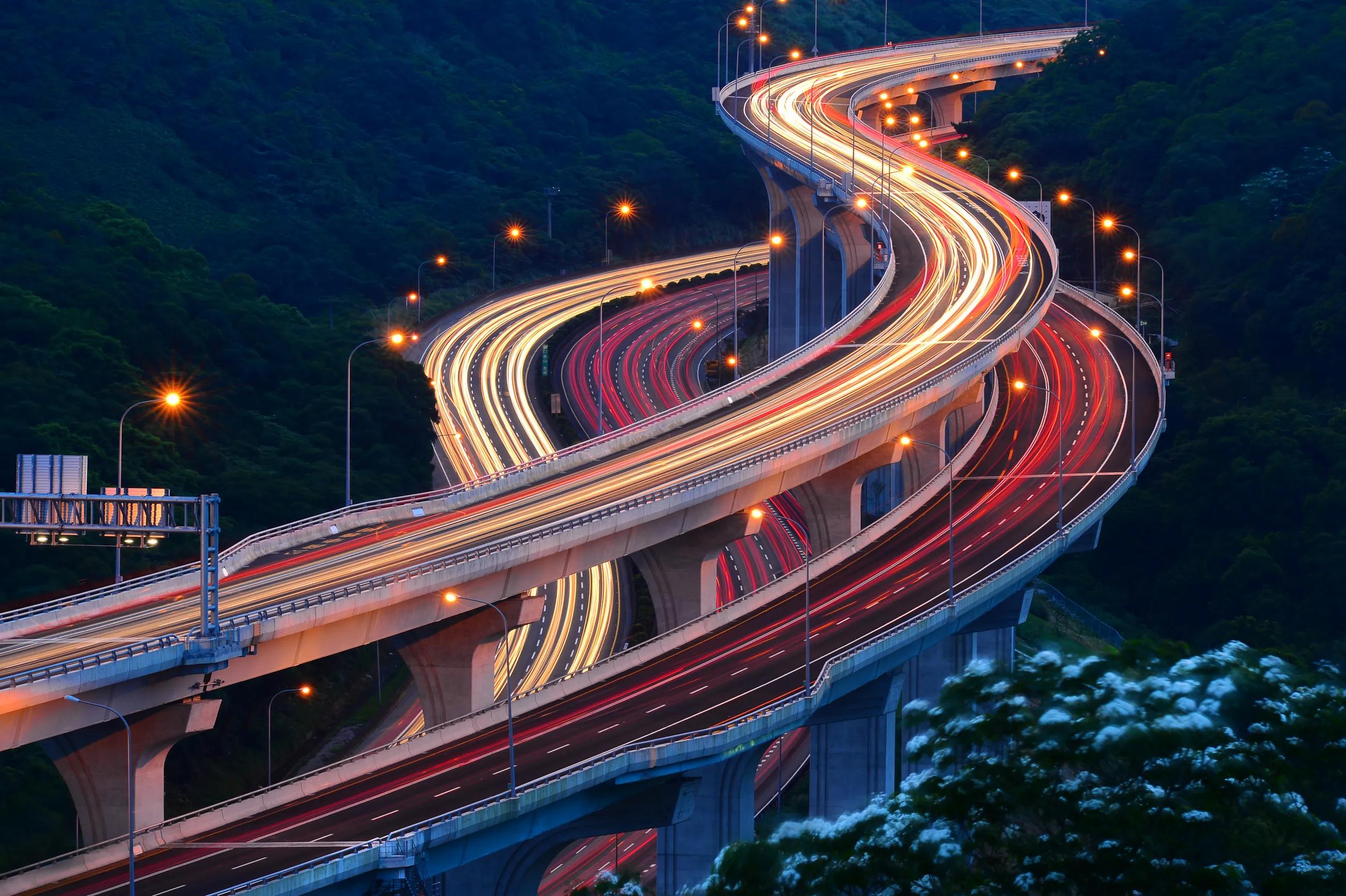 Multiple winding bridges at night